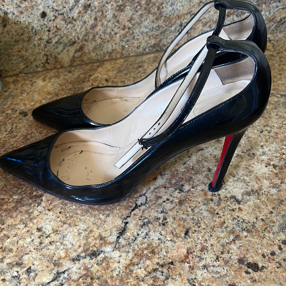 Christian Louboutin Black Pumps 
Size: 9
